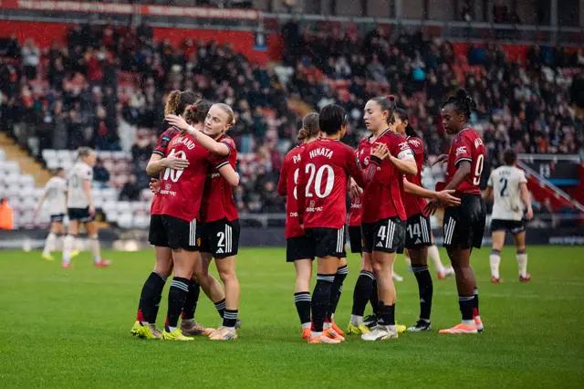 Elisabeth Terland of Manchester United celebrates scoring her teams first goal with teammates during the Barclays Women's Super League match between Manchester United and West Ham United at Progress with Unity Stadium on December 07, 2025 in Leigh, England.