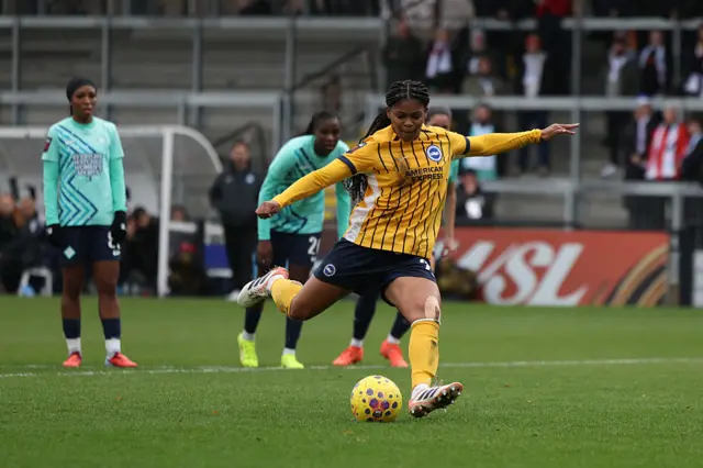 Madison Haley of Brighton & Hove Albion takes a penalty kick which is saved by Elene Lete of London City Lionesses (not pictured) during the Barclays Women's Super League match between London City Lionesses and Brighton & Hove Albion at Copperjax Community Stadium on December 07, 2025 in Bromley, England.