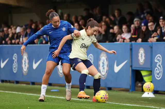 Lauren James of Chelsea battles for possession with Clare Wheeler of Everton during the Barclays Women's Super League match between Chelsea FC and Everton at Kingsmeadow on December 07, 2025 in Kingston upon Thames, England. (