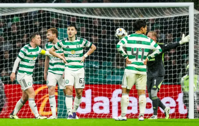Celtic defenders look dejected