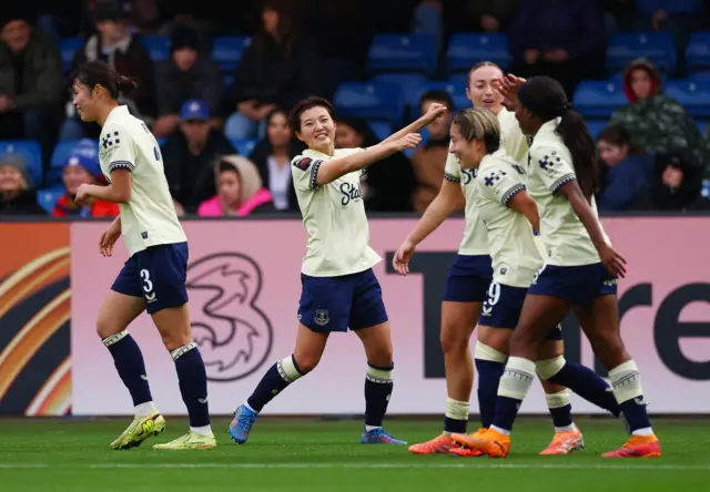 Everton's Honoka Hayashi celebrates scoring their first goal with teammates