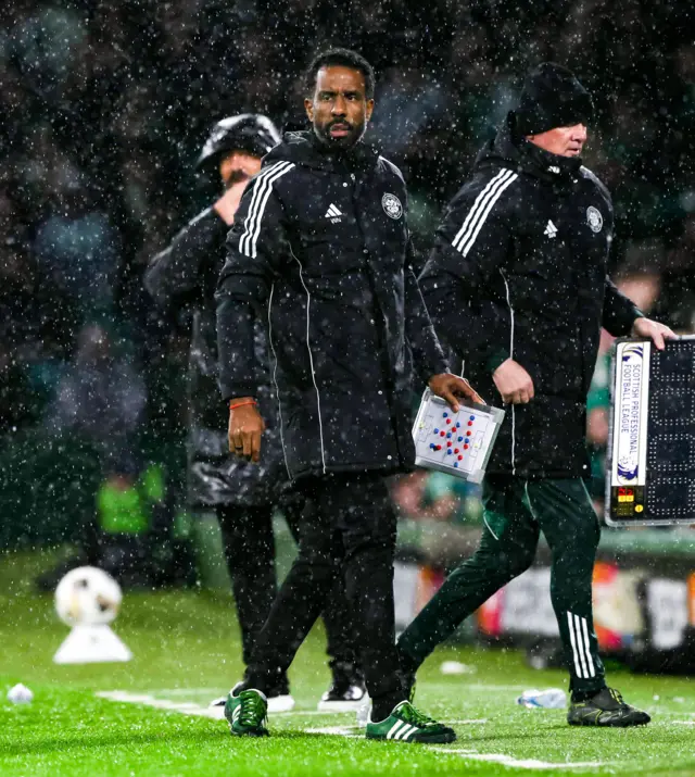 Wilfriend Nancy holds his tactics board on the touchline