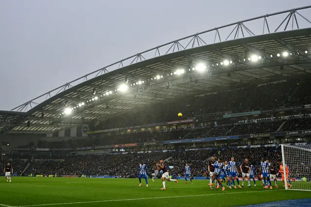 West Ham United's Portuguese midfielder #18 Mateus Fernandes (C) reacts as the ball is cleared in front of goal during the English Premier League football match between Brighton and Hove Albion and West Ham United at the American Express Community Stadium in Brighton, southern England on December 7, 2025.