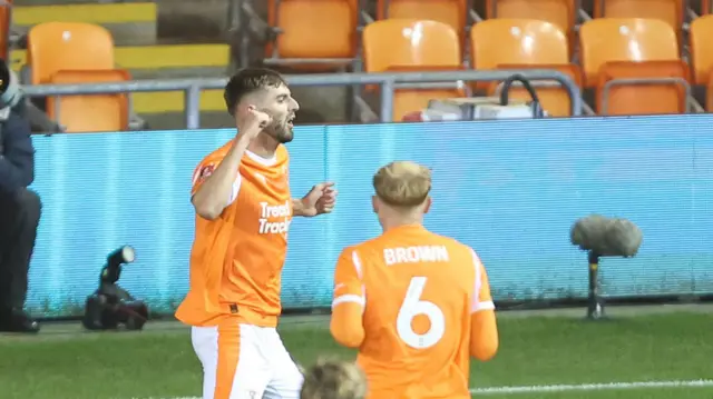 Tom Bloxham celebrates for Blackpool