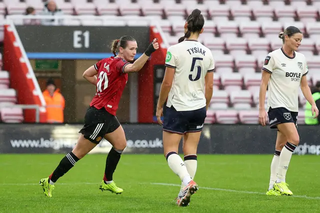 Elisabeth Terland of Manchester United celebrates scoring her team's first goal during the Barclays Women's Super League match between Manchester United and West Ham United at Progress with Unity Stadium on December 07, 2025 in Leigh, England.