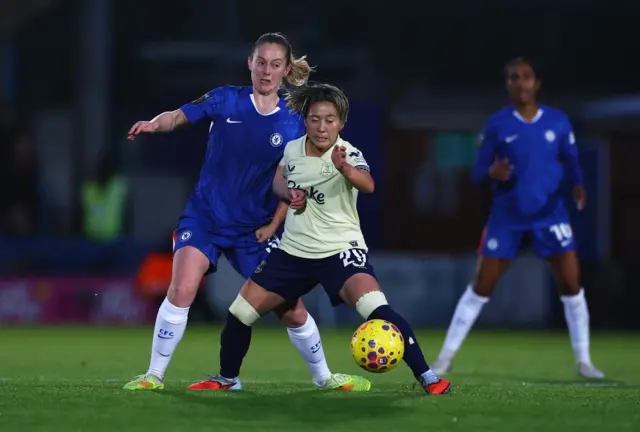 Chelsea's Keira Walsh in action with Everton's Yuka Momiki