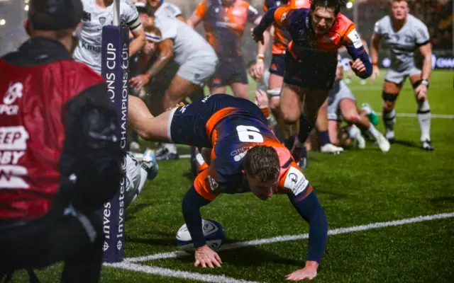 Ben Vellacott leaps over in the corner for his try