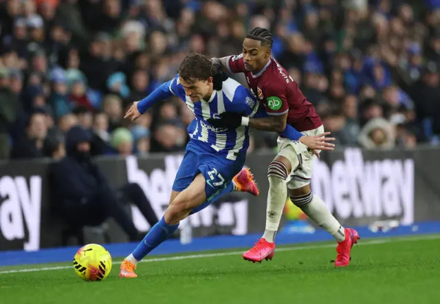 Brighton & Hove Albion's Mats Wieffer in action with West Ham United's Crysencio Summerville