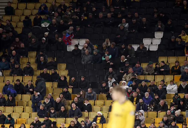 Empty seats are seen amongst Wolverhampton Wanderers fans during the Premier League match between Wolverhampton Wanderers and Manchester United at Molineux on December 08, 2025 in Wolverhampton, England.
