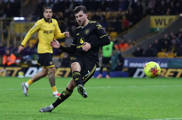 Manchester United's English midfielder #07 Mason Mount scores the team's third goal during the English Premier League football match between Wolverhampton Wanderers and Manchester United at the Molineux stadium in Wolverhampton, central England on December 8, 2025.