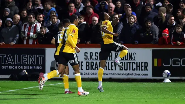 Tyrese Shade leaps in celebration