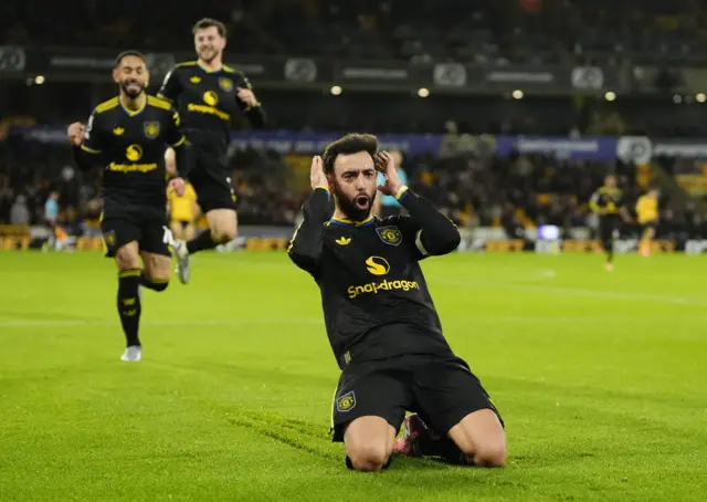 Manchester United's Bruno Fernandes celebrates scoring their side's first goal of the game during the Premier League match at Molineux Stadium, Wolverhampton. Picture date: Monday December 8, 2025.