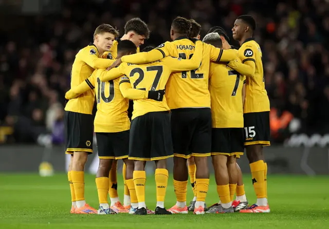 Wolverhampton Wanderers players huddle prior to the Premier League match between Wolverhampton Wanderers and Manchester United at Molineux on December 08, 2025 in Wolverhampton, England.