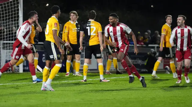 Michael Nottingham celebrates his goal against Burton