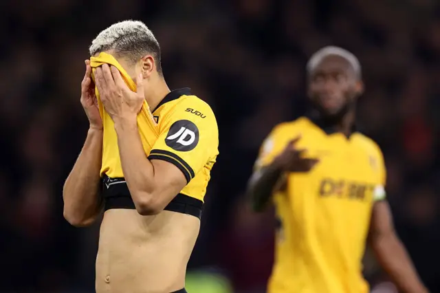 Andre of Wolverhampton Wanderers looks dejected during the Premier League match between Wolverhampton Wanderers and Manchester United at Molineux on December 08, 2025 in Wolverhampton, England.
