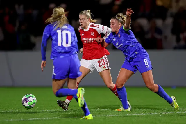 Alessia Russo of Arsenal is challenged by Danique van Ginkel of FC Twente during the UEFA Women's Champions League 2025/26 league phase match between Arsenal FC and FC Twente at Meadow Park on December 09, 2025 in Borehamwood, England.