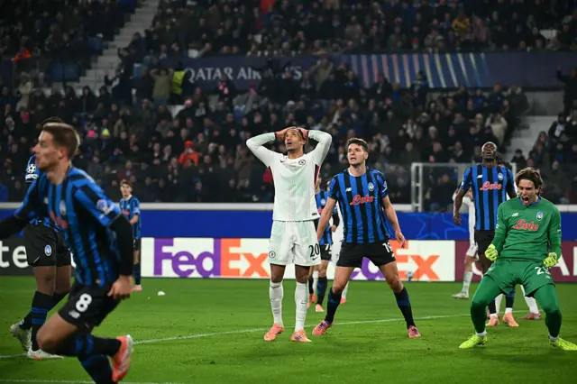 Joao Pedro with his hands on his head