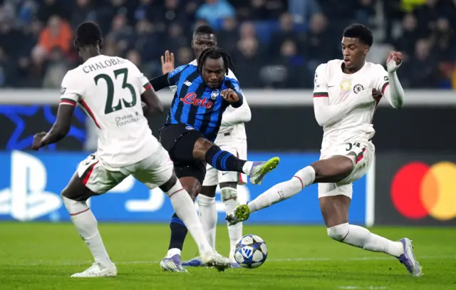 Chelsea's Josh Acheampong in action with Atalanta's Ademola Lookman