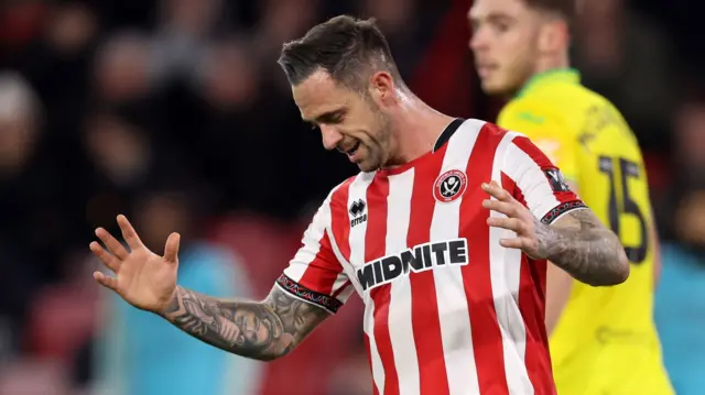 Danny Ings reacts to a missed chance