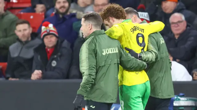 Josh Sargent helped off the field