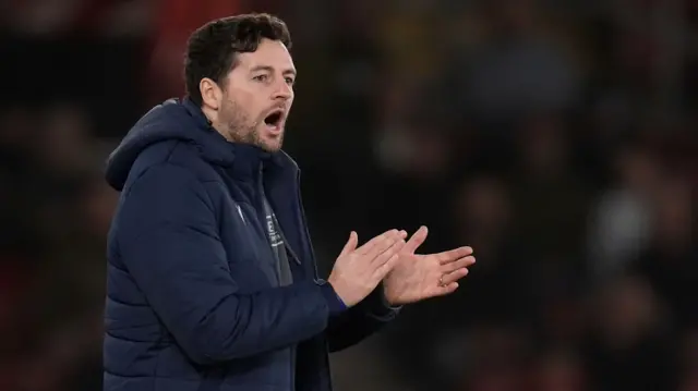 Ryan Mason applauds