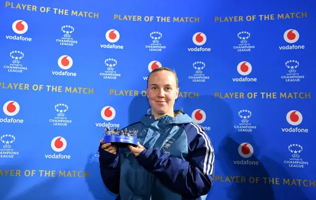 Mead poses with her POTM award