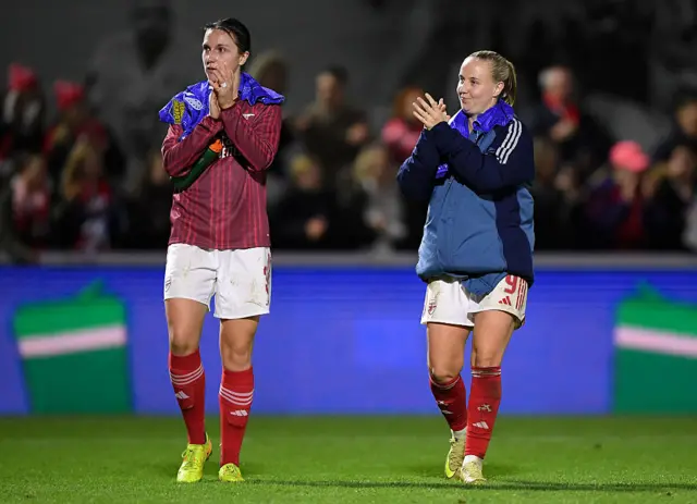Wubben-Moy and Mead clap the fans at full time
