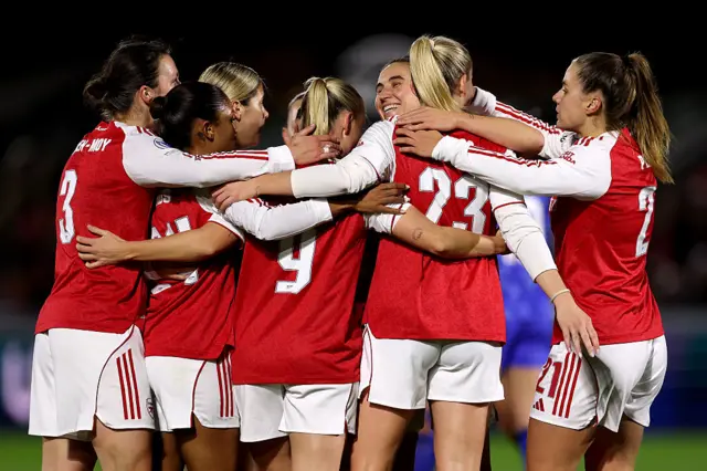 Beth Mead of Arsenal celebrates scoring her team's first goal with teammates during the UEFA Women's Champions League 2025/26 league phase match between Arsenal FC and FC Twente at Meadow Park