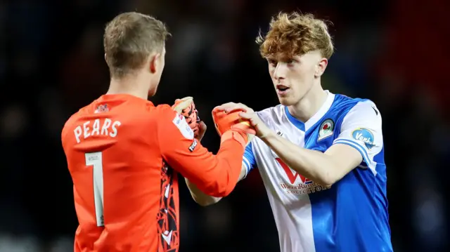 Blackburn players embrace