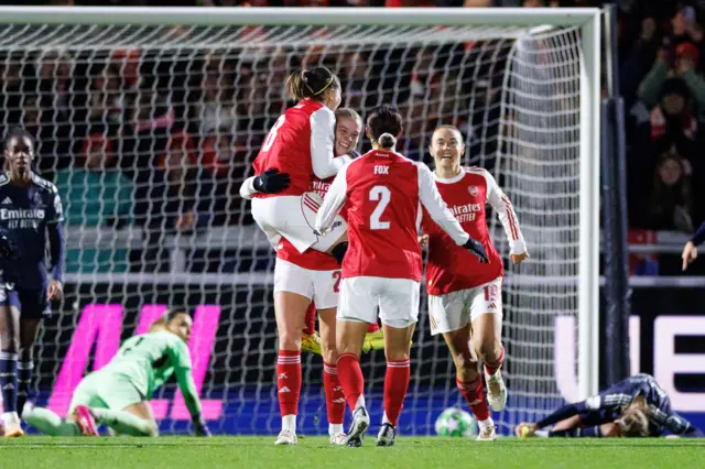 Arsenal celebrate Alessia Russo's first goal v Madrid on MD4
