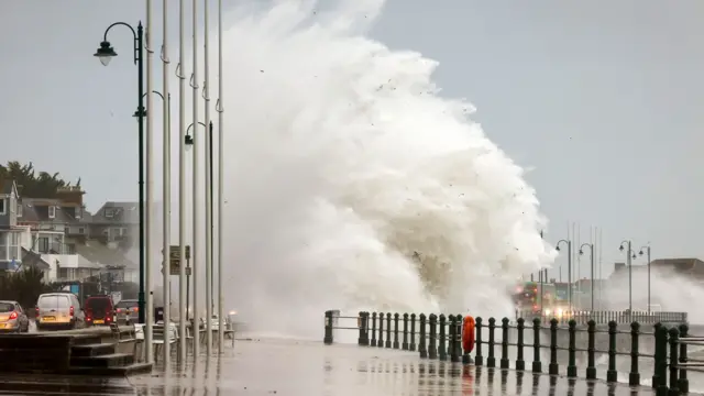 Huge waves crashing into the promenade in Penzance