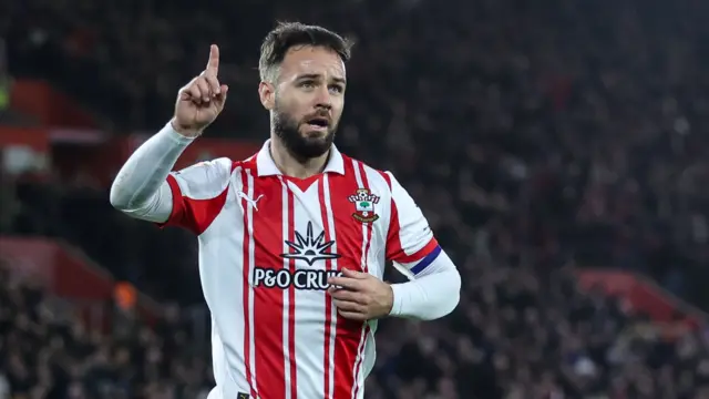 Adam Armstrong celebrates