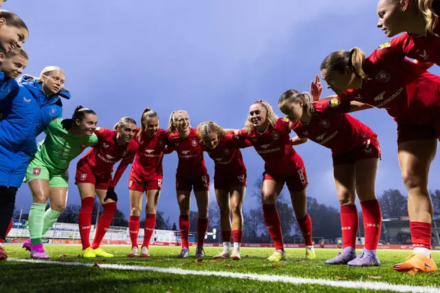 Twente players huddle pre match