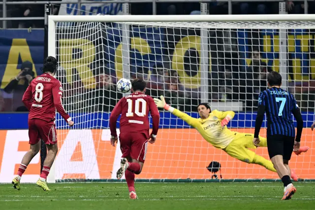 Dominik Szoboszlai of Liverpool scores
