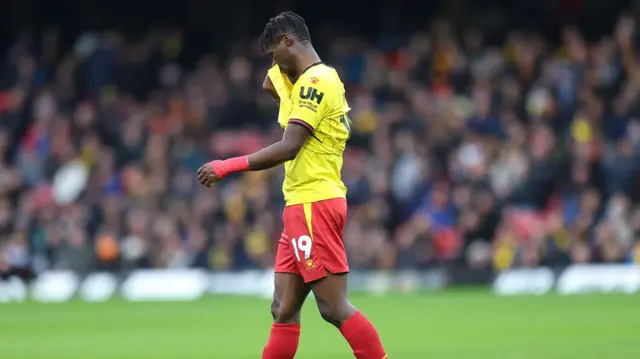 Watford's Vakoun Bayo leaves the field following his red card