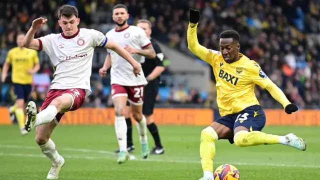 Oxford's Siriki Dembele takes on Bristol City's Jason Knight