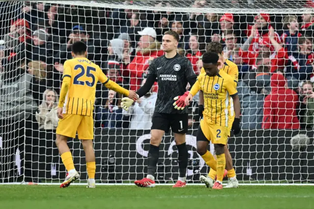 Brighton defenders console Verbruggen after Forest's seventh goal