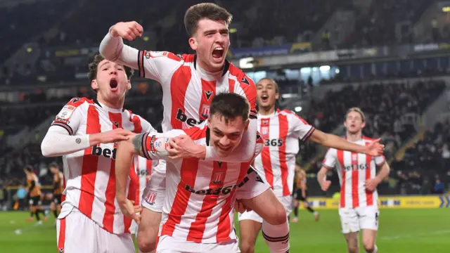 Stoke players celebrate Andrew Moran's winner at Hull