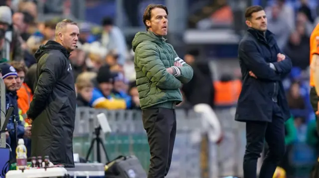 Burnley head coach Scott Parker watches on at Fratton Park