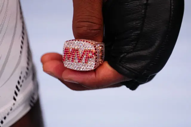 Michael Page shows off his MVP diamond ring