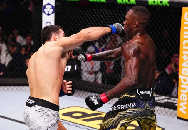 Imavov lands a right hand on Israel Adesanya