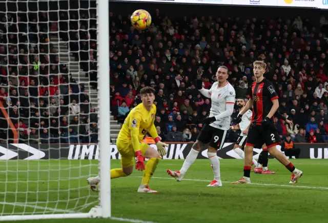 Salah bends the ball into the top corner