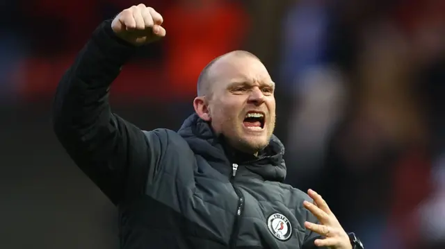 Liam Manning celebrates after beating Blackburn at Ashton Gate