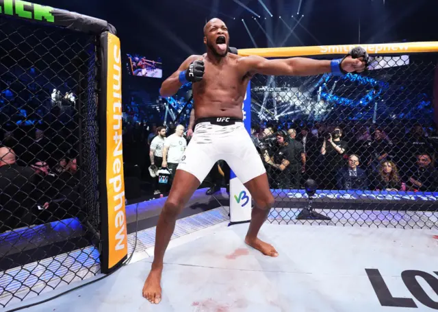 Michael Page shouts as he enters the octagon