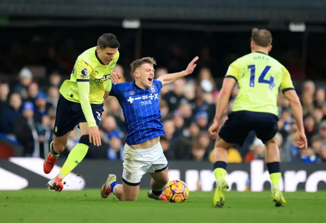 Delap is dragged to the floor by Bednarek