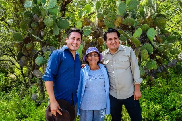 Fred Sanchez, left with Felix Monterrosa from Agua del Sol and Reyna Rodriguez, a maestro maezcalera