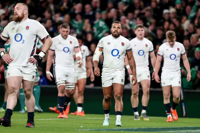 England players dejected after conceding a try