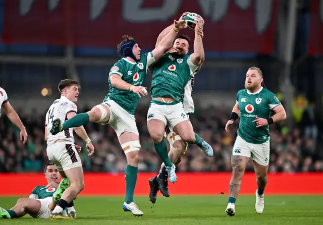 Ireland playing contesting for the ball after a kick