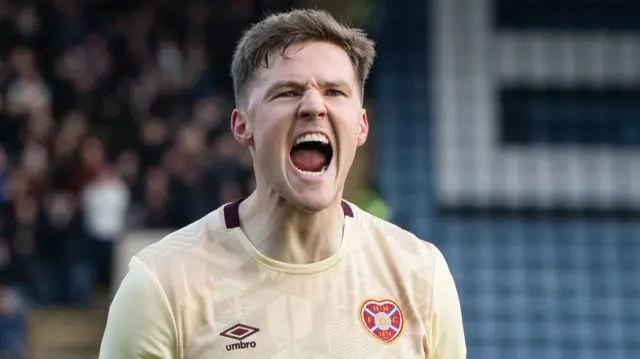 Blair Spittal celebrates after scoring for Hearts against Dundee