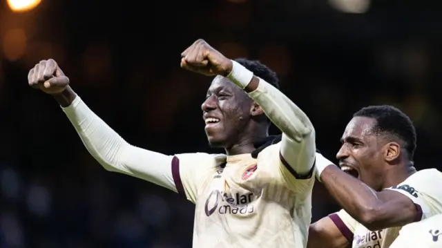 Hearts' Musa Drammeh (L) celebrates with Elton Kabangu (R)after scoring to make it 4-0 during a William Hill Premiership match between Dundee and Heart of Midlothian at the Scot Foam Stadium at Dens Park, on February 01, 2025, in Dundee, Scotland. (Photo by Mark Scates / SNS Group)